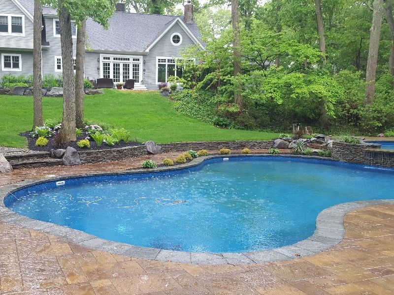 mountain lake pool with cambridge pavers